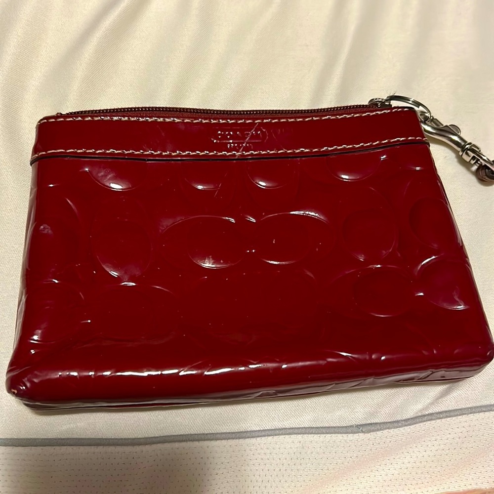 Coach wristlet. Maroon